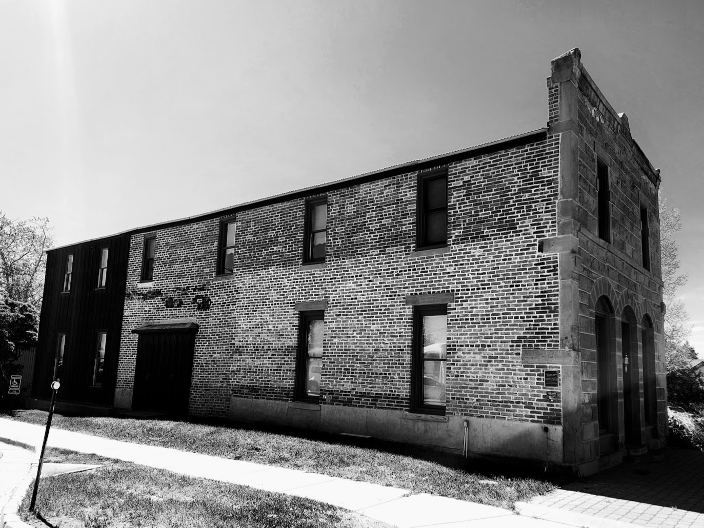 Historic brick Wolff Building on a quiet Westcliffe street