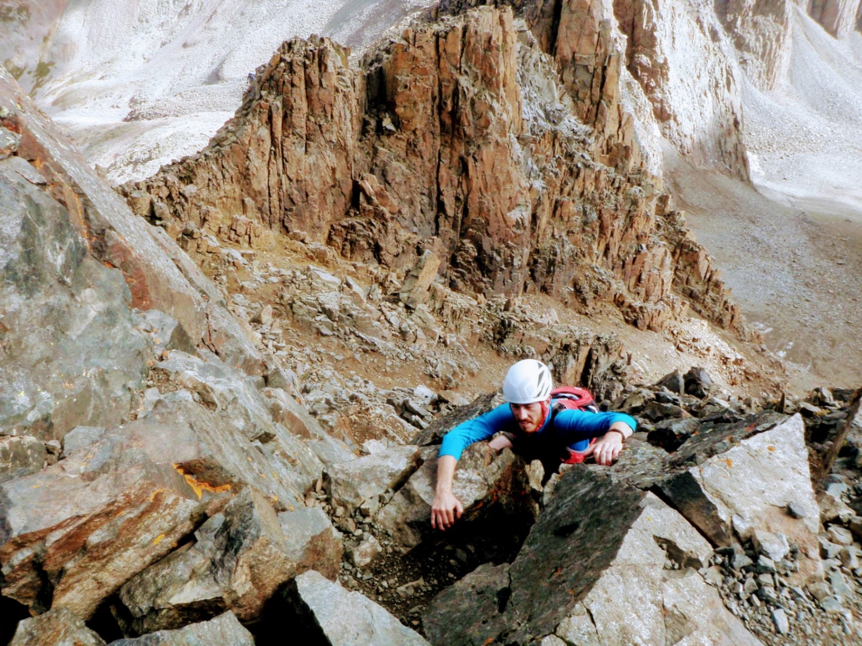 Dan scrambling up a rugged 14er ridge in the Sangre de Cristos
